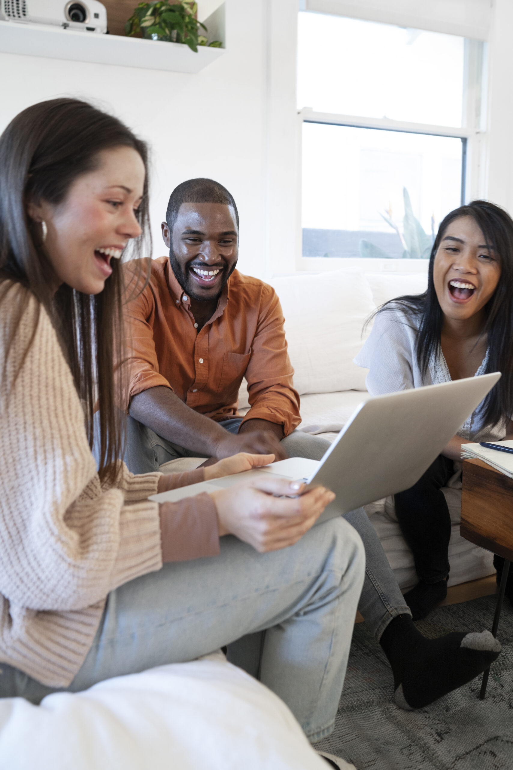group-young-people-using-laptop-together-home-sofa